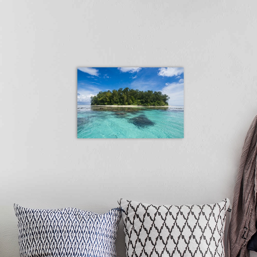 A bohemian room featuring Turquoise water and a white beach on Christmas Island, Buka, Bougainville, Papua New Guinea, Pacific
