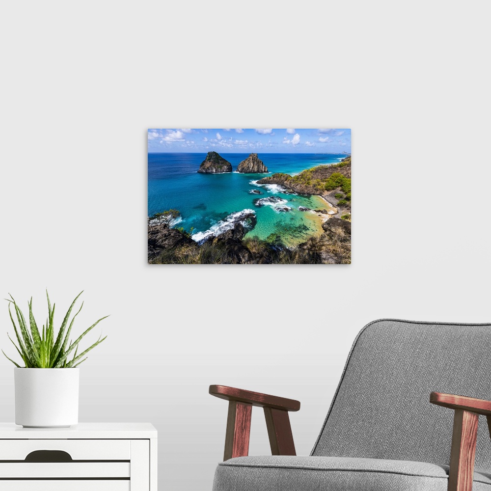 A modern room featuring Turquoise water around the Two Brothers rocks, Fernando de Noronha, UNESCO World Heritage Site, B...