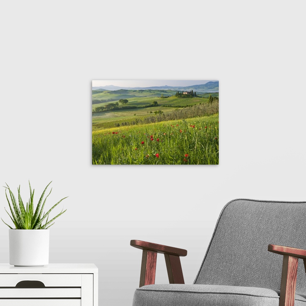 A modern room featuring Val d'Orcia showing Belvedere and rolling Tuscan countryside, Tuscany, Italy