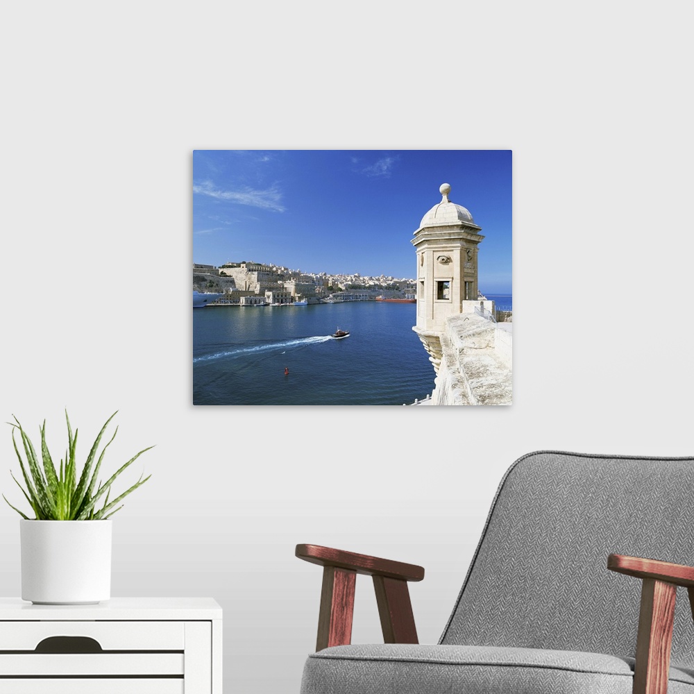 A modern room featuring Valletta viewed over the Grand Harbour, Malta, Mediterranean