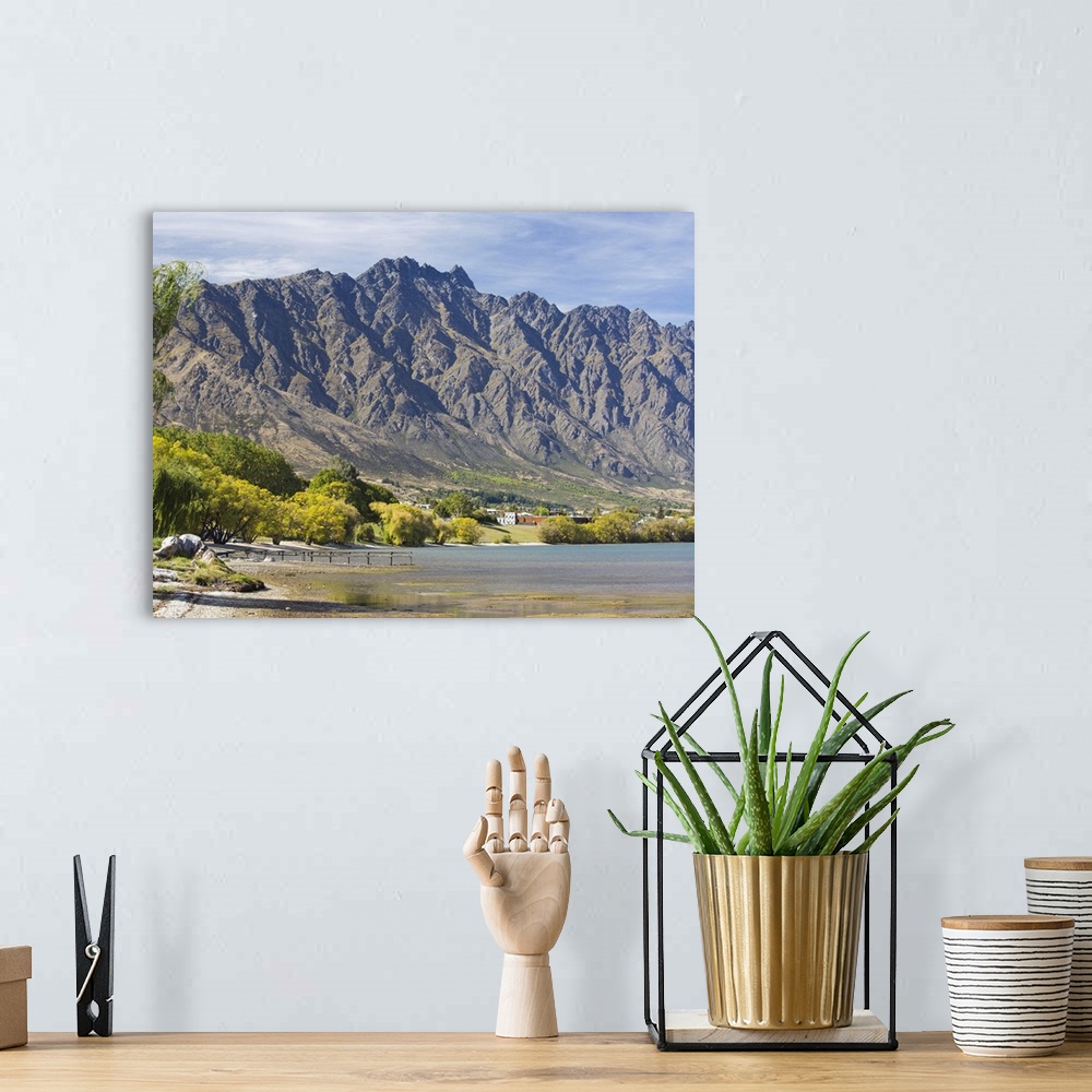 A bohemian room featuring View across Frankton Arm to the Remarkables, autumn, Queenstown, Queenstown-Lakes district, Otago...
