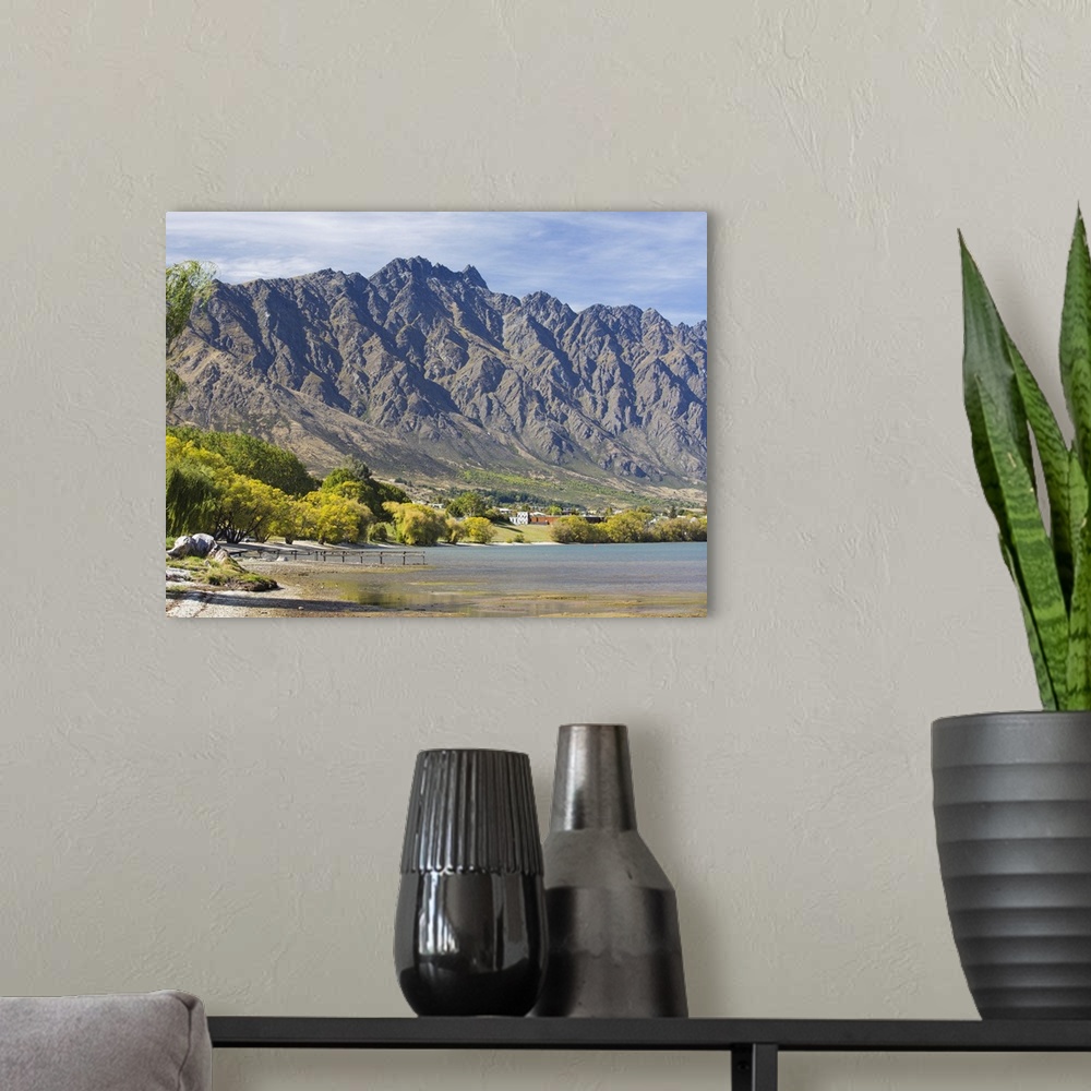 A modern room featuring View across Frankton Arm to the Remarkables, autumn, Queenstown, Queenstown-Lakes district, Otago...