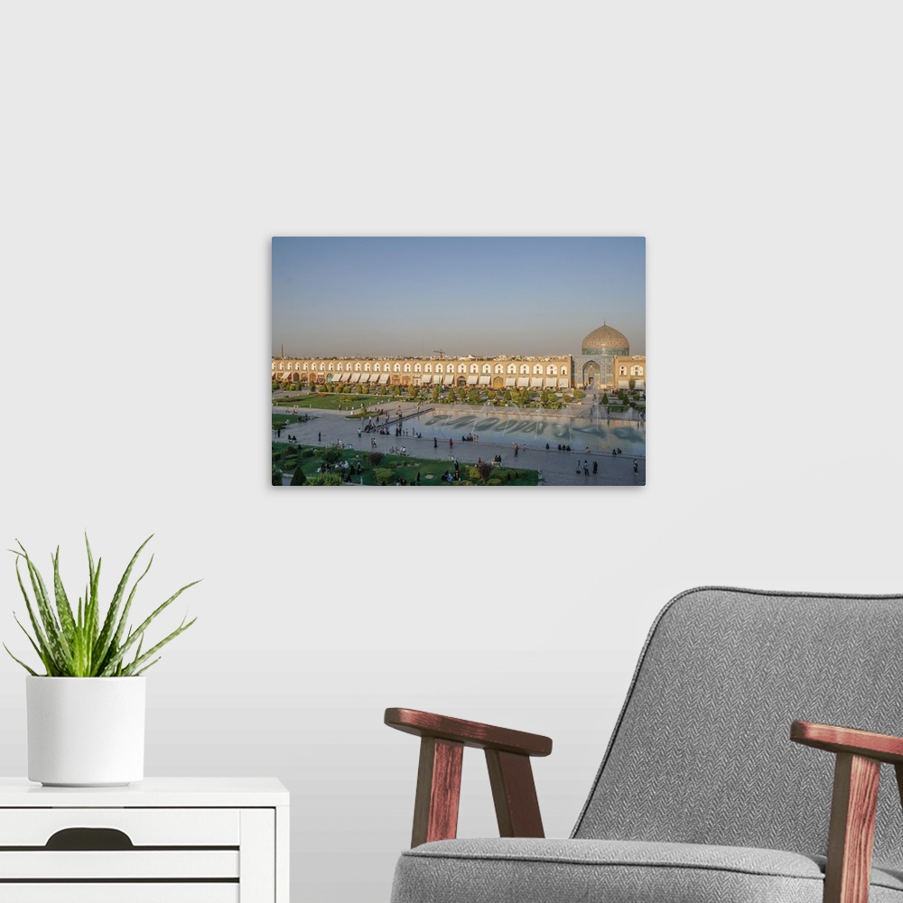 A modern room featuring View across Naqsh-e (Imam) Square, UNESCO World Heritage Site, from Ali Qapu Palace opposite Shei...