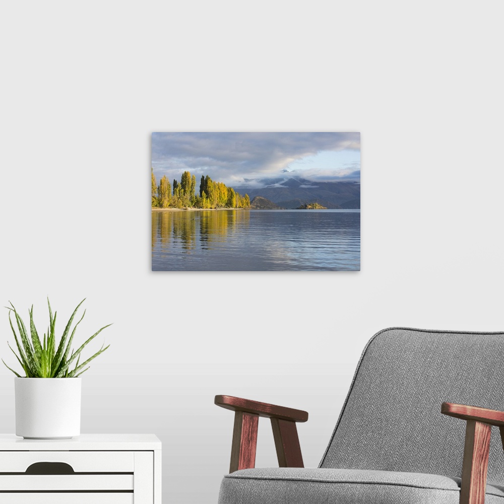 A modern room featuring View across tranquil Lake Wanaka, autumn, Roys Bay, Wanaka, Queenstown-Lakes district, Otago, Sou...