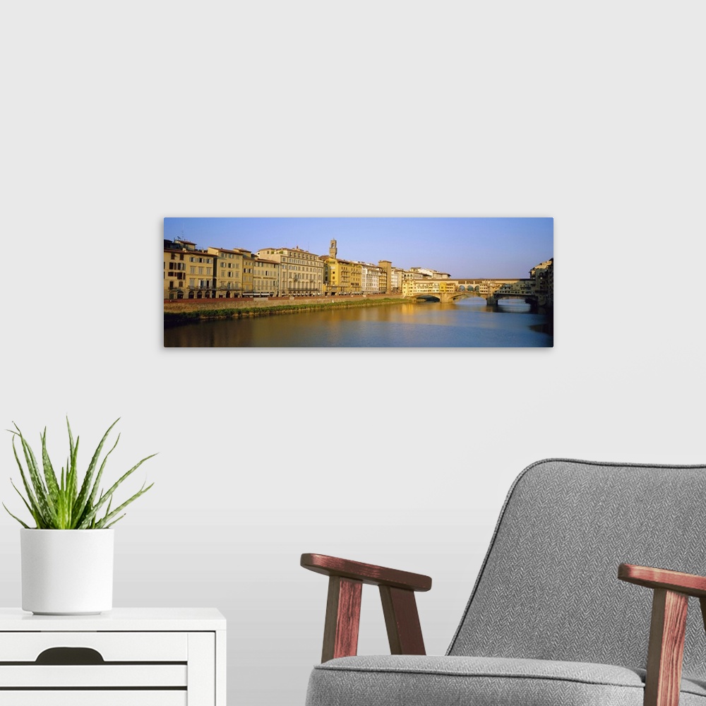 A modern room featuring View along River Arno to Ponte Vecchio, Florence, Tuscany, Italy