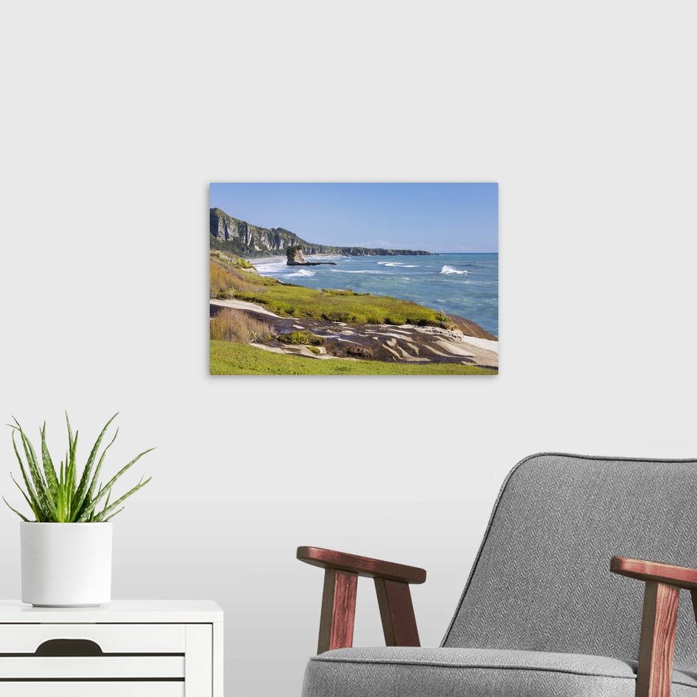A modern room featuring View along the Tasman Sea coast to Dolomite Point, Punakaiki, Paparoa National Park, Buller distr...
