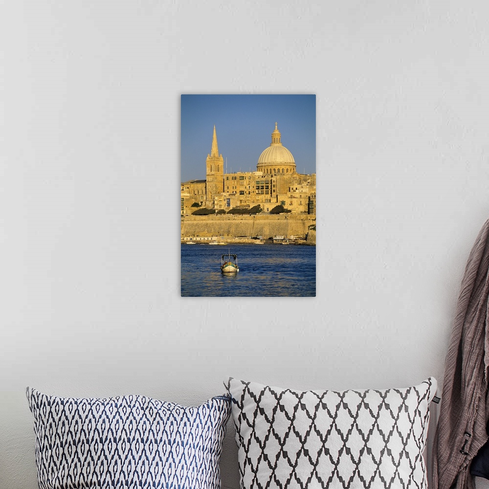 A bohemian room featuring View at sunset to Valletta with Dome of Carmelite Church, Valletta, Malta, Mediterranean