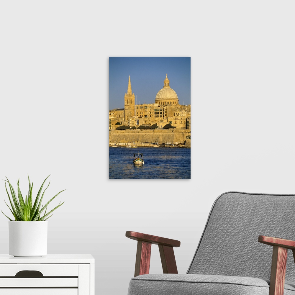 A modern room featuring View at sunset to Valletta with Dome of Carmelite Church, Valletta, Malta, Mediterranean
