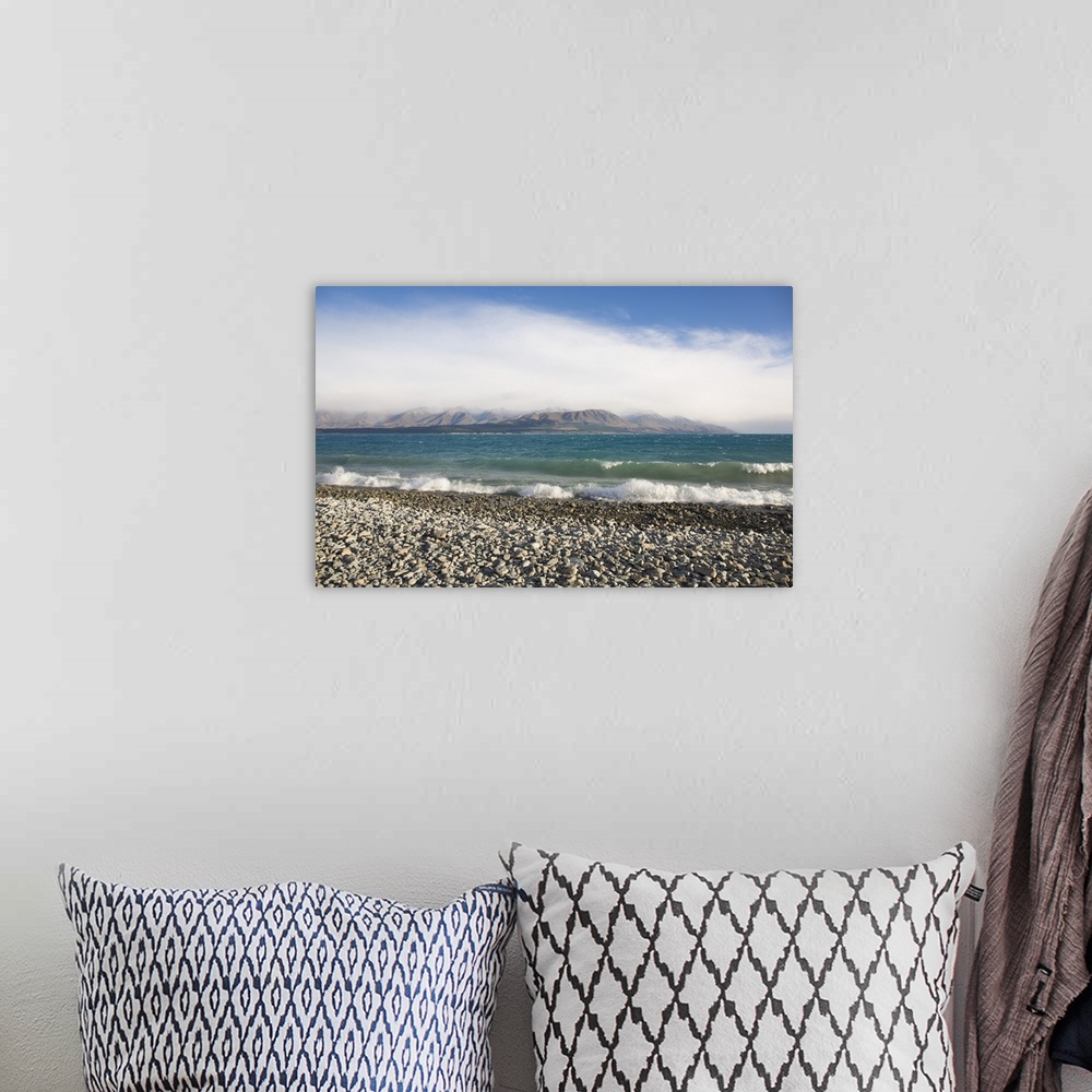 A bohemian room featuring View from rocky shoreline across the stormy waters of Lake Pukaki, near Twizel, Mackenzie distric...