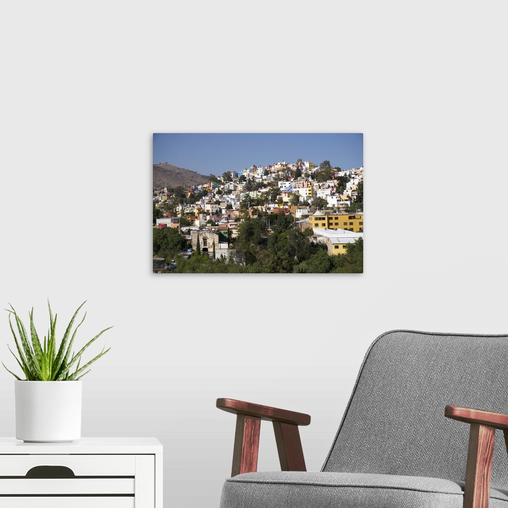 A modern room featuring View from Templo de San Diego, distant view of the city, Guanajuato, Mexico