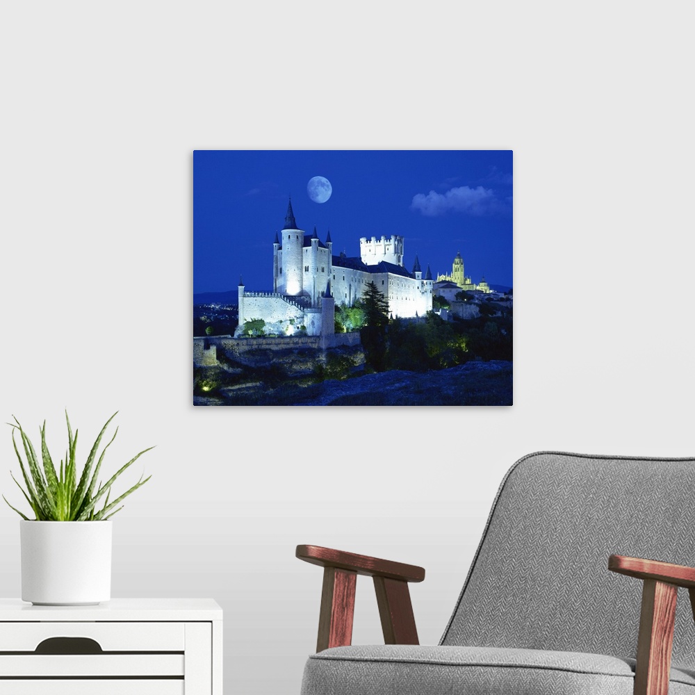 A modern room featuring View of castle illuminated, Segovia, Spain