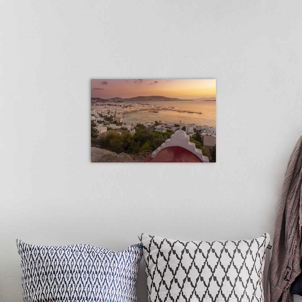 A bohemian room featuring View of chapel and town from elevated view point at sunset, Mykonos Town, Mykonos, Cyclades Islan...