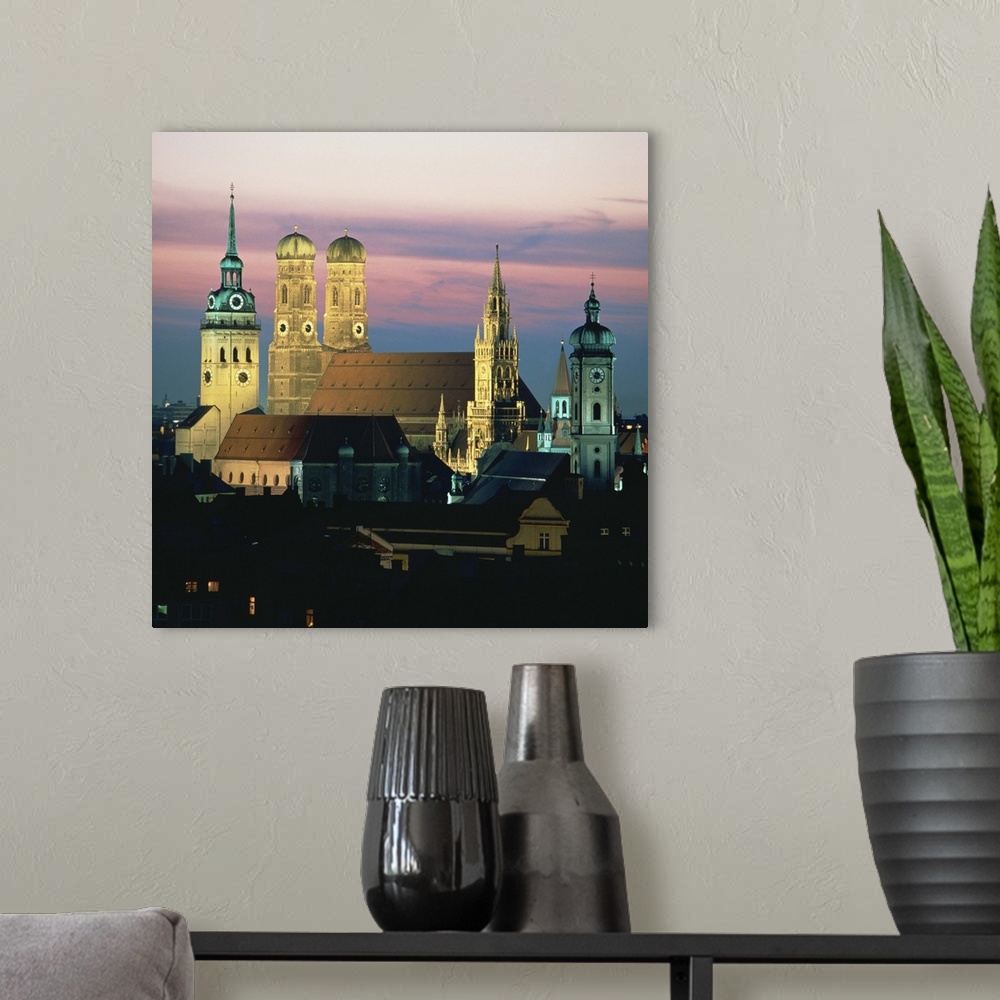 A modern room featuring View of Frauenkirch and city at night, Munich, Bavaria, Germany, Europe