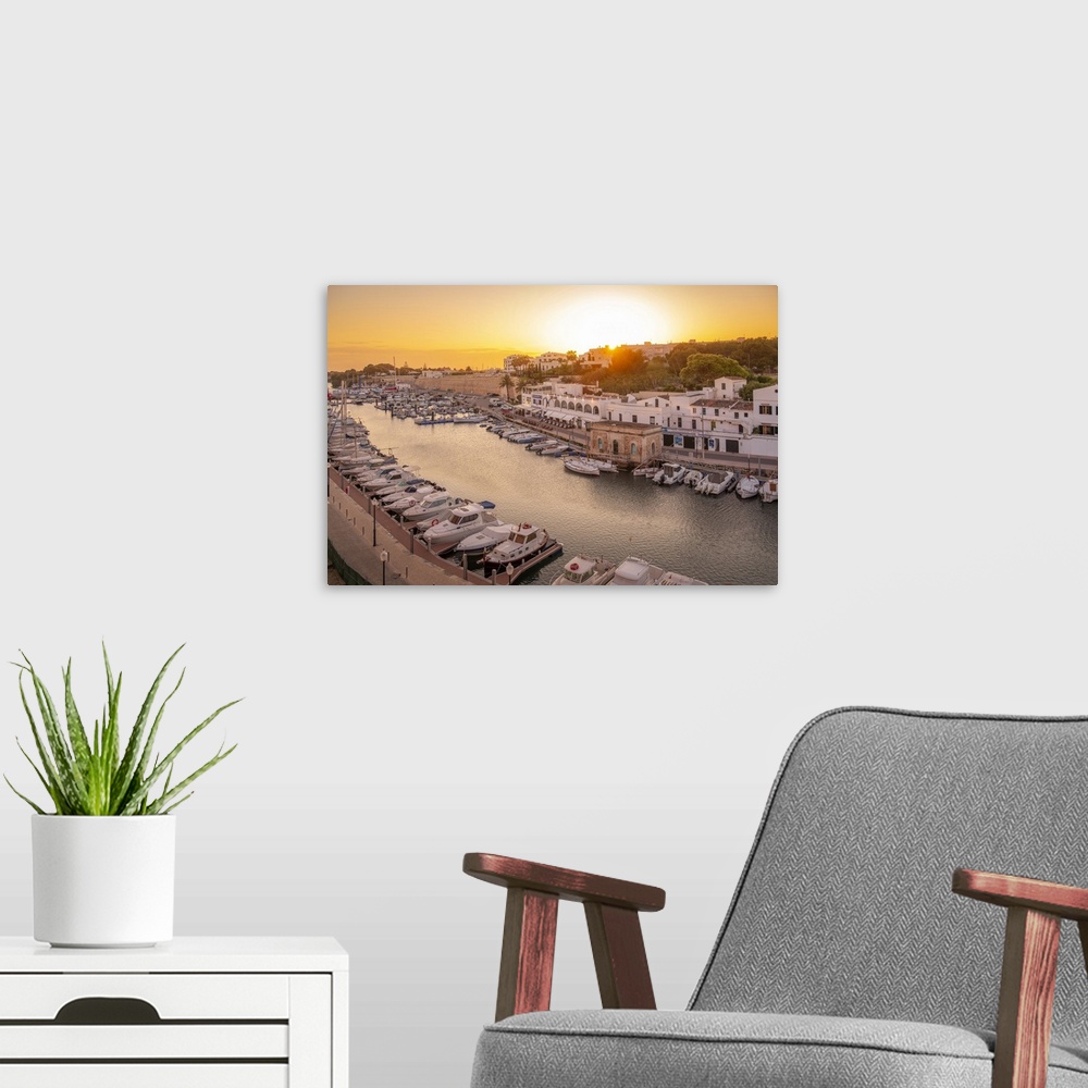 A modern room featuring View of marina at sunset from elevated position, Ciutadella, Menorca, Balearic Islands, Spain, Me...