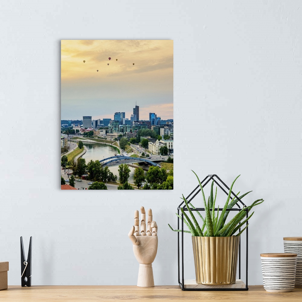 A bohemian room featuring View over Neris River towards Snipiskes, New City Centre, sunset, Vilnius, Lithuania, Europe