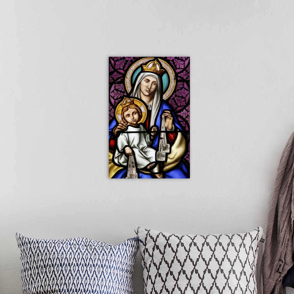 A bohemian room featuring Virgin and Child, stained glass in Pont L'Abbe church, Brittany, France