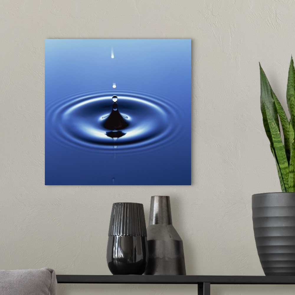 A modern room featuring Water droplet hitting water surface creating ripples
