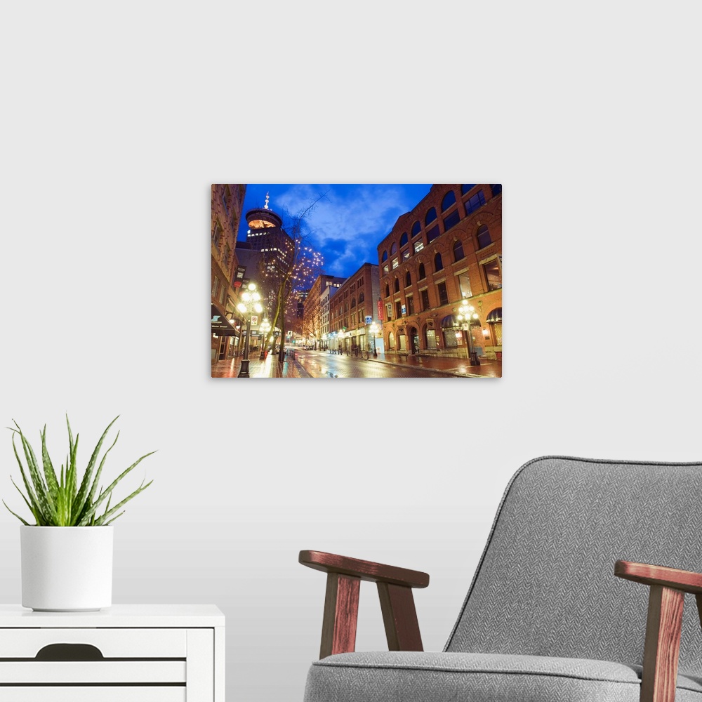A modern room featuring Water Street at night, Gastown, Vancouver, British Columbia, Canada