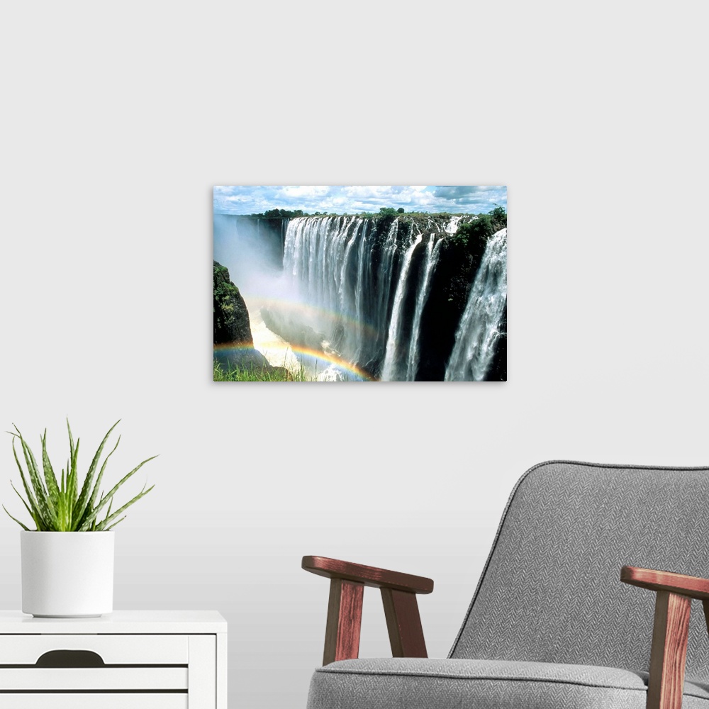 A modern room featuring Waterfalls and rainbows, Victoria Falls, UNESCO World Heritage Site, Zambia, Africa