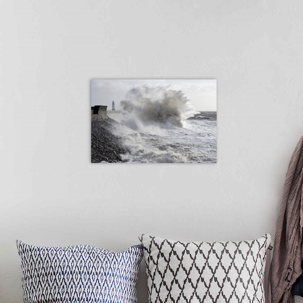A bohemian room featuring Waves crash against the harbour wall at Porthcawl, Bridgend, Wales, United Kingdom, Europe