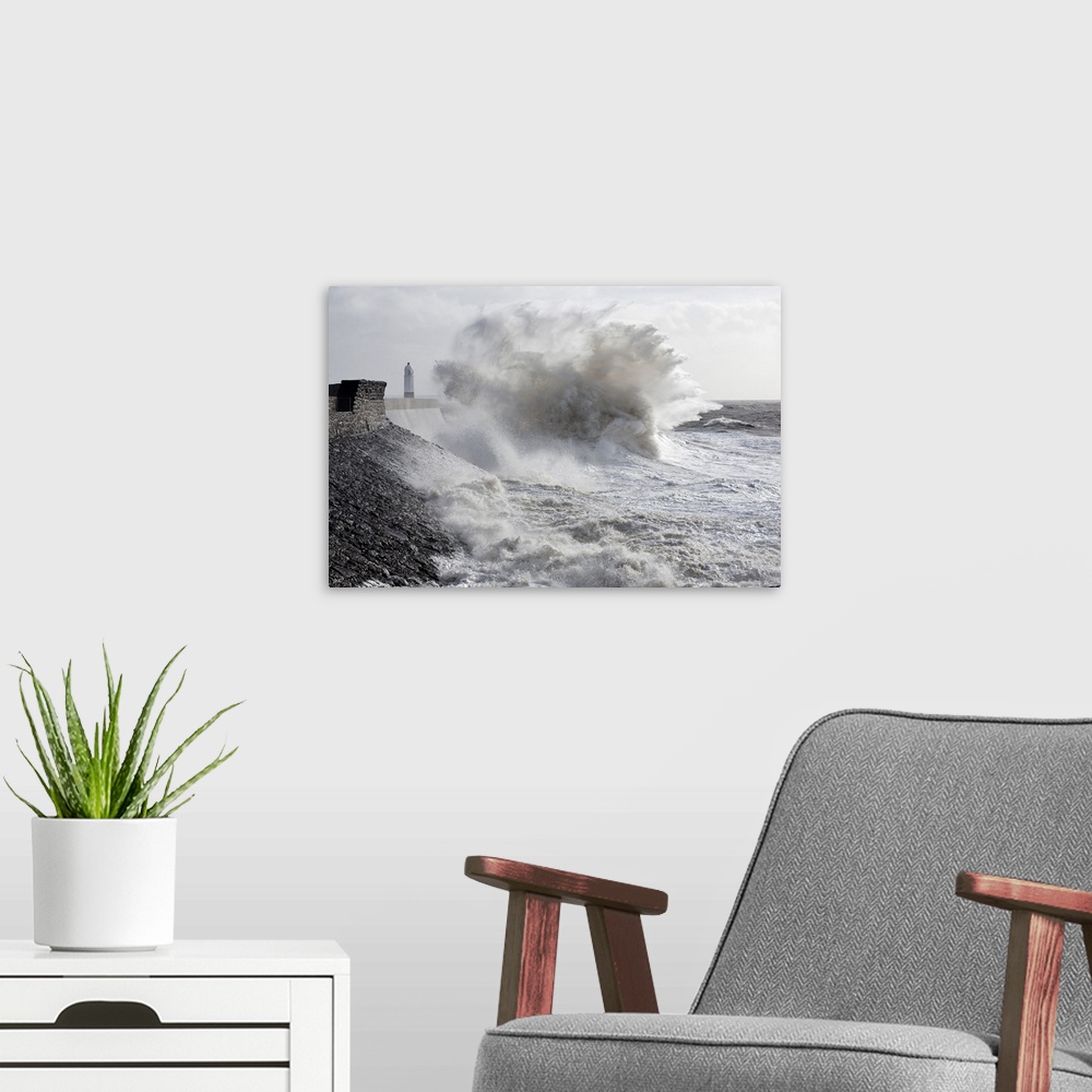 A modern room featuring Waves crash against the harbour wall at Porthcawl, Bridgend, Wales, United Kingdom, Europe