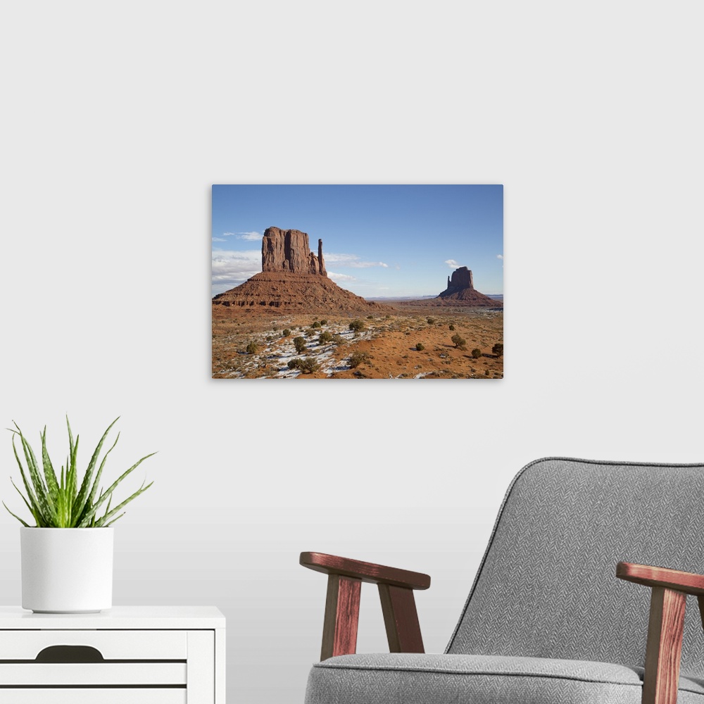 A modern room featuring West Mitten Butte on left and East Mitten Butte on right, Monument Valley Navajo Tribal Park, Utah