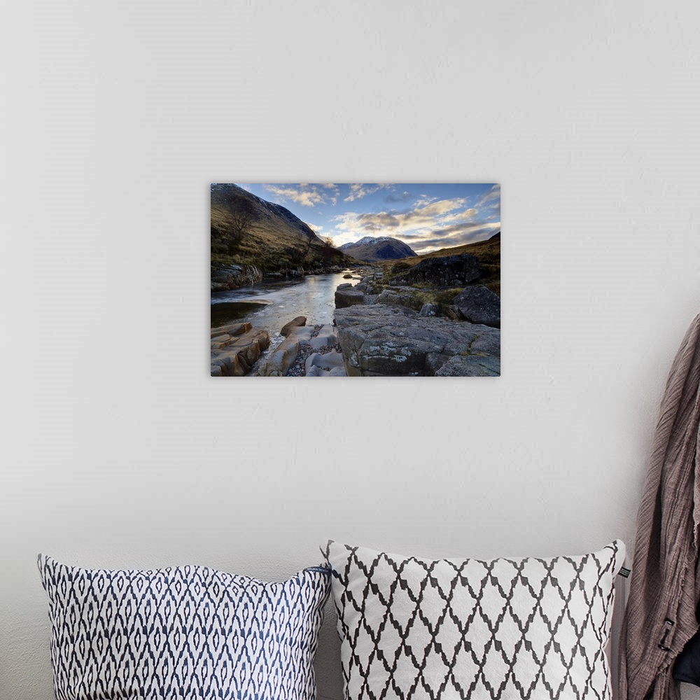 A bohemian room featuring Winter view along partly-frozen River Etive towards distant mountains, Scotland
