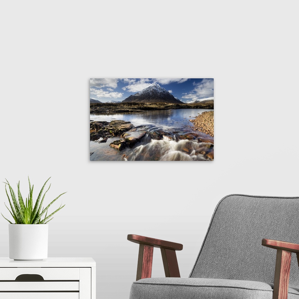 A modern room featuring Winter view over River Etive towards snow-capped mountains, Rannoch Moor, Scotland