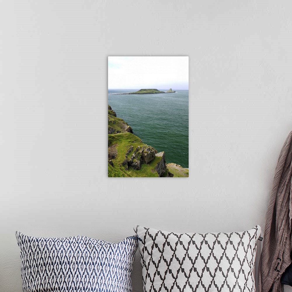 A bohemian room featuring Worm's head peninsula, Rhossili Bay, The Gower, Wales, UK