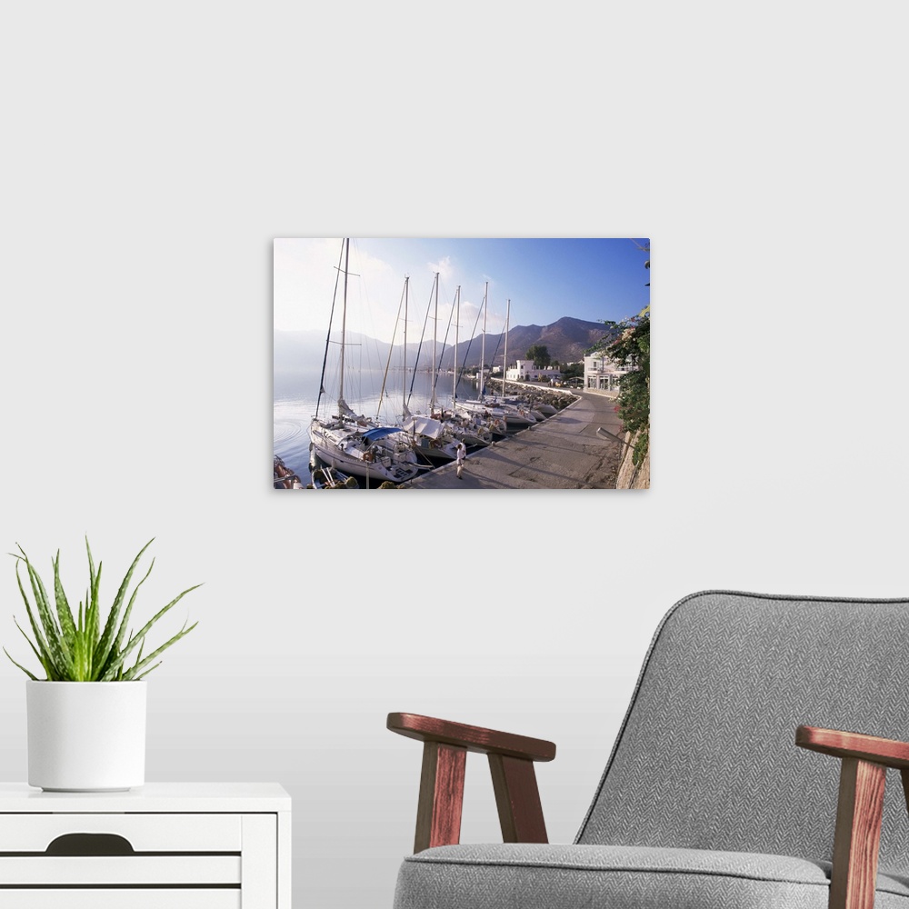 A modern room featuring Yachts, Livadhia, island of Tilos, Dodecanese, Greece, Europe