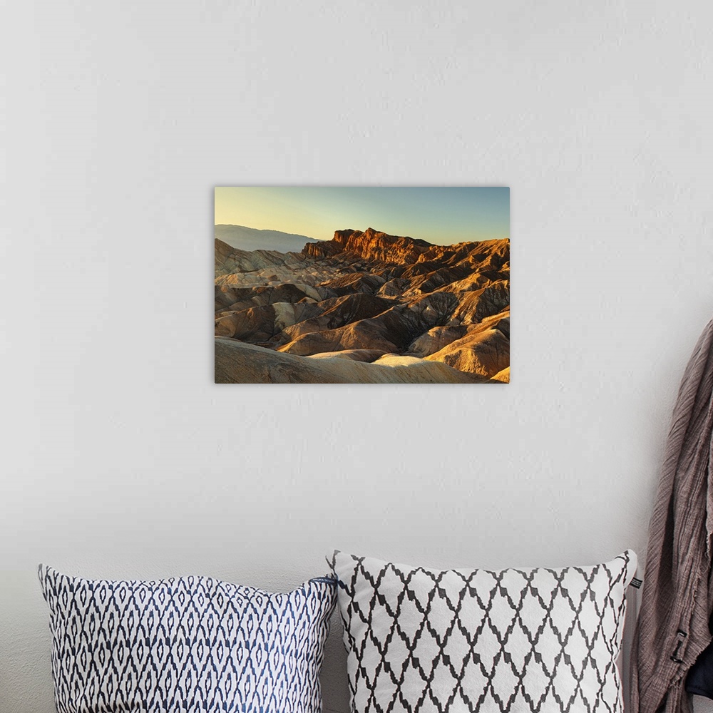 A bohemian room featuring Zabriskie Point at sunrise, Death Valley National Park, California, United States of America, Nor...