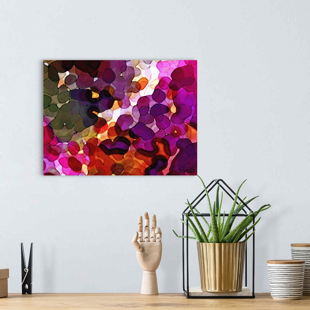 A bohemian room featuring Large, abstract art with blobs of pink, purple, and orange hues layered on top of each other.