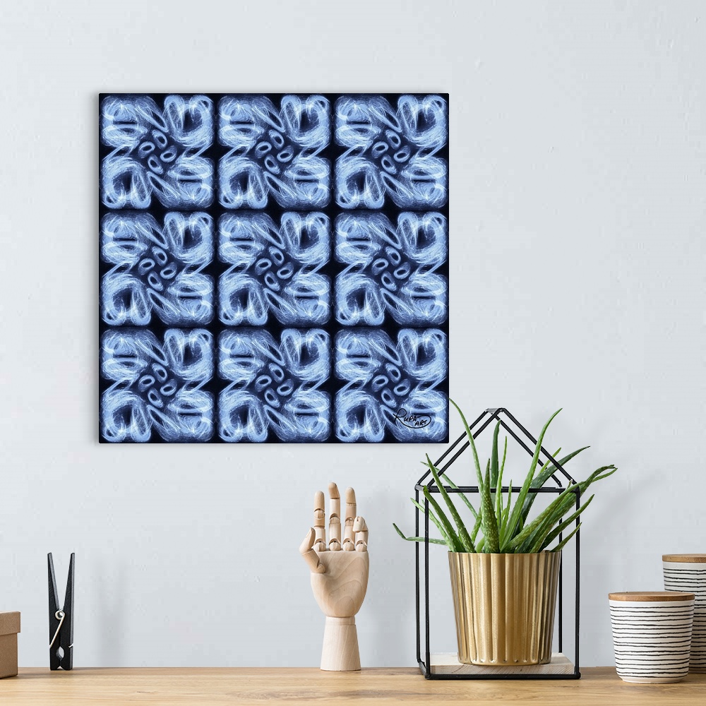 A bohemian room featuring Square artwork with a repetitive pattern of brush stroked circles in blue and white.