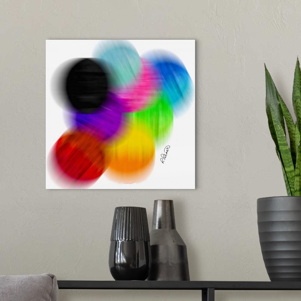 A modern room featuring A square image of multi-colored blurred circles on a white backdrop.