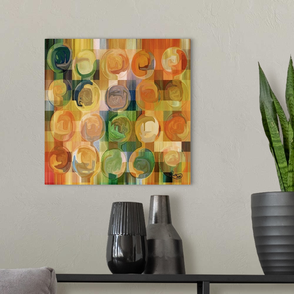 A modern room featuring Square abstract art with a colorful checkered background and swirly circles on top.