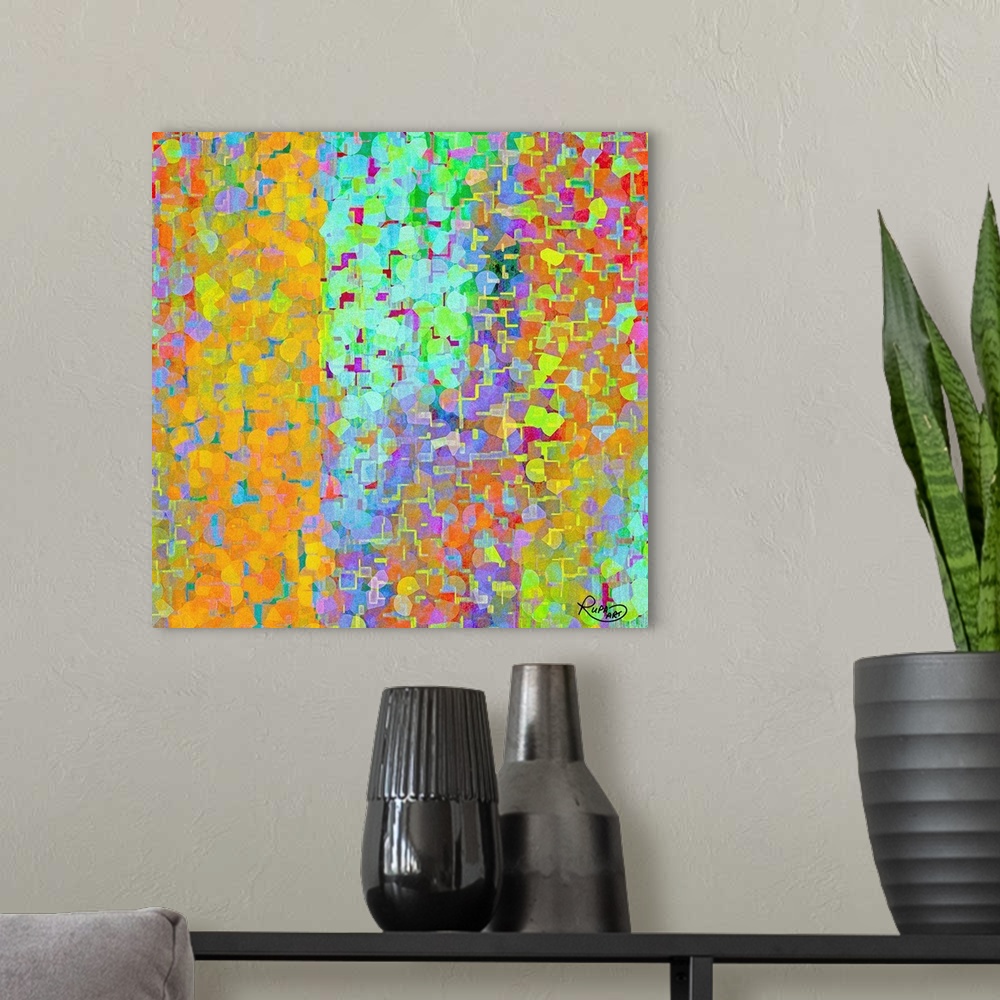 A modern room featuring Square abstract artwork in a rainbow of colors with circular and line shapes.