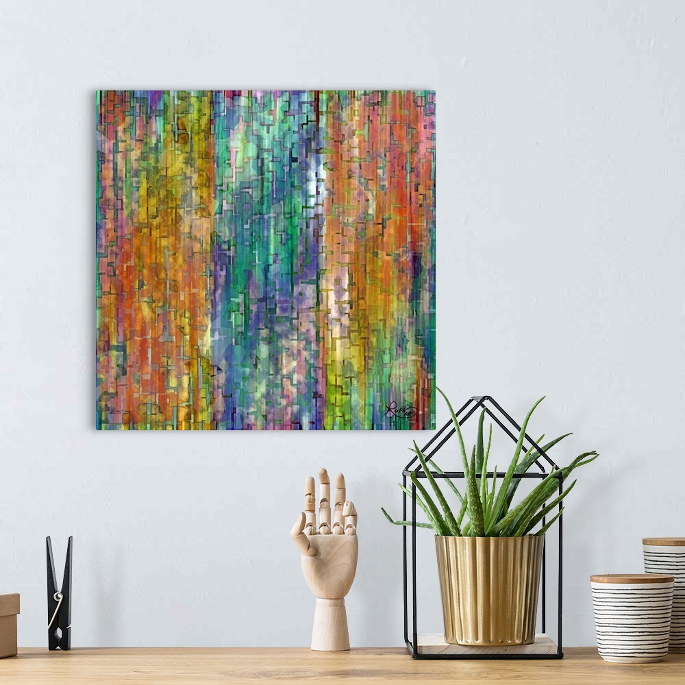 A bohemian room featuring Square abstract artwork in a rainbow of colors with small block and line shapes.