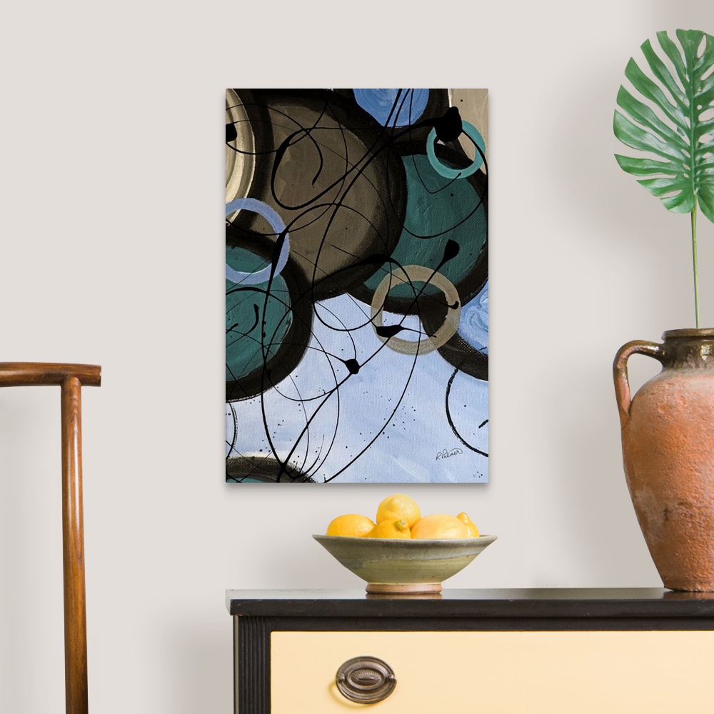 A traditional room featuring A contemporary abstract painting using circle and paint drizzle in mute tones.