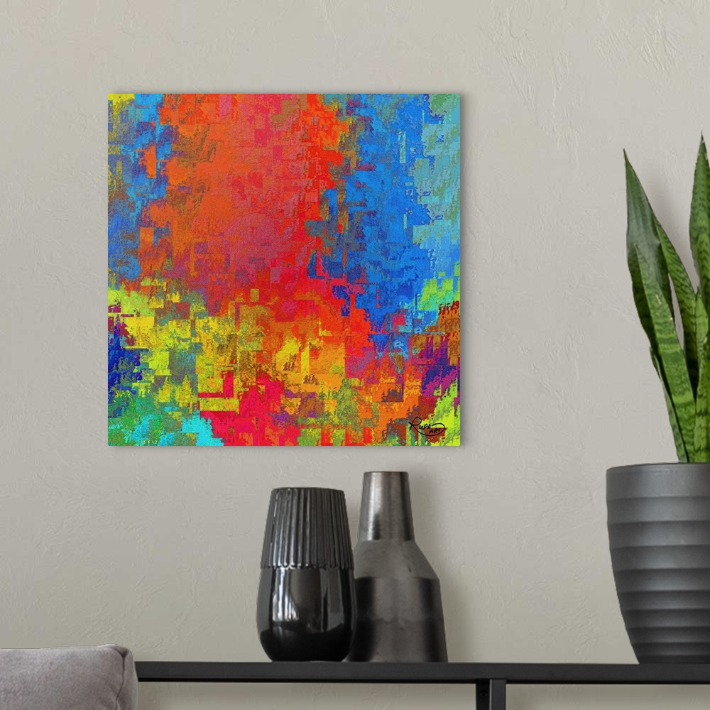 A modern room featuring Square abstract art with shapes and textures layered together in all colors of the rainbow.