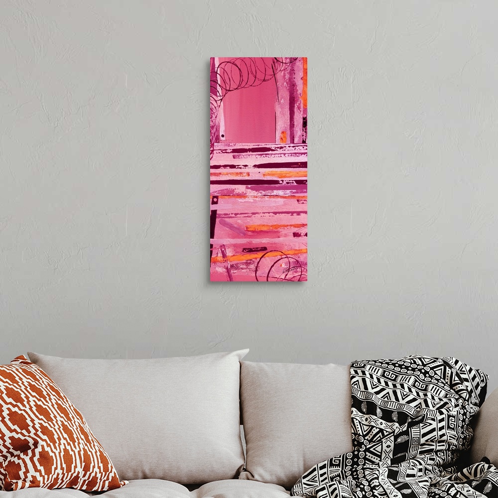 A bohemian room featuring Tall abstract painting in shades of pink, red, and orange with maroon swirling designs on top.