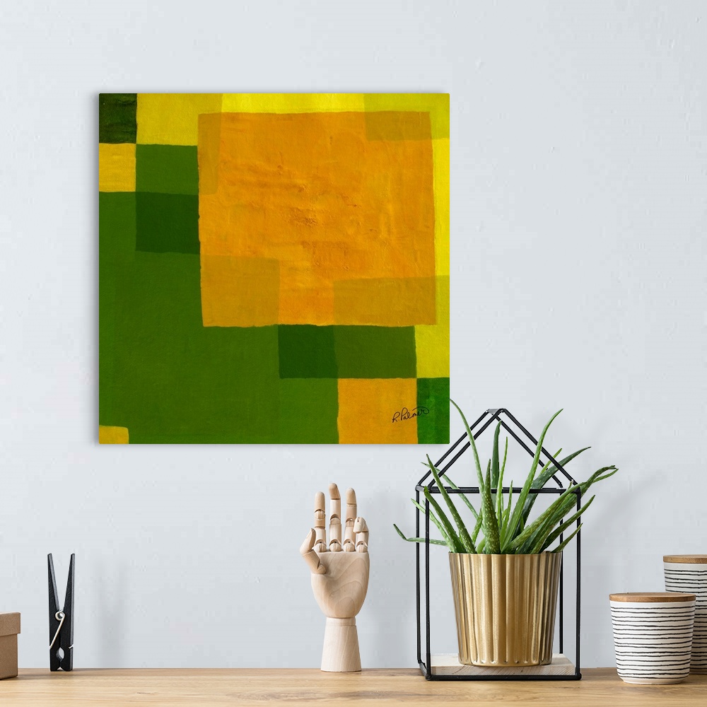 A bohemian room featuring Square abstract painting with layered geometric squares in shades of green and yellow.