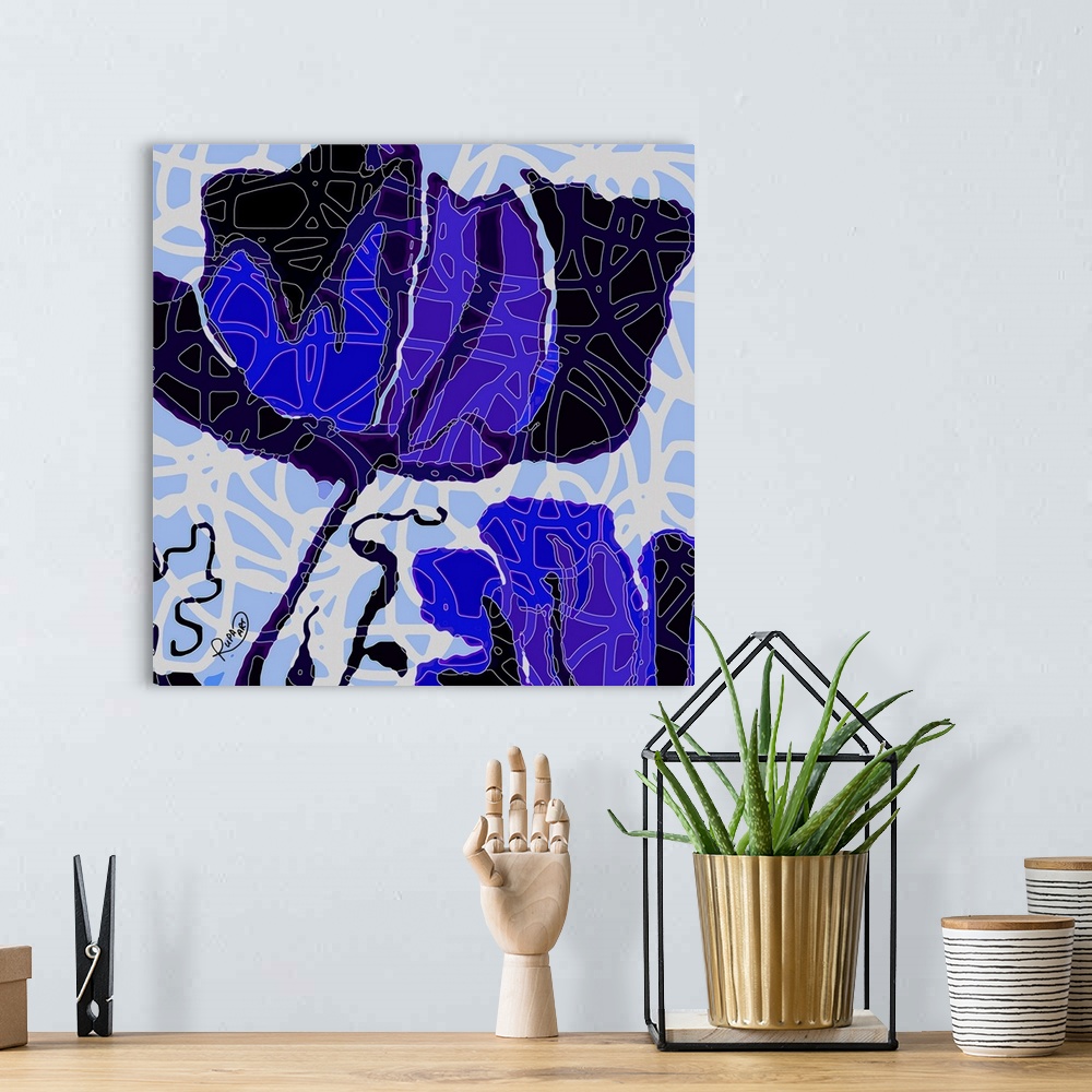 A bohemian room featuring Square abstract art of a large black and blue flower with white outlined designs on top.
