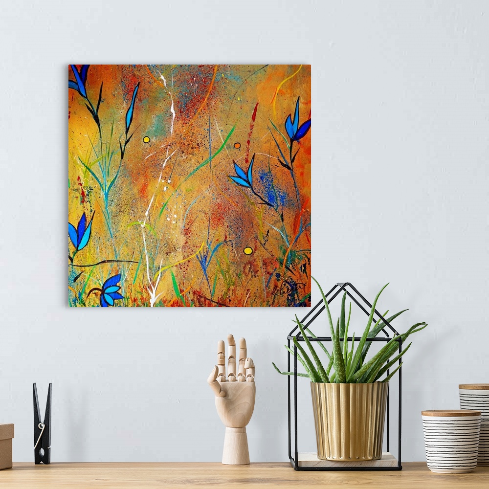 A bohemian room featuring Square, giant artwork for a living room or office of several small ,spikey blue flowers on a back...