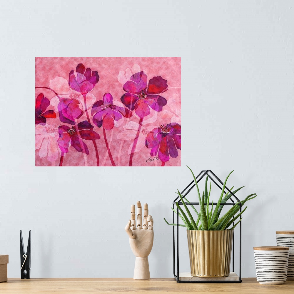 A bohemian room featuring A horizontal image of a group of flowers in varies shades of pink.