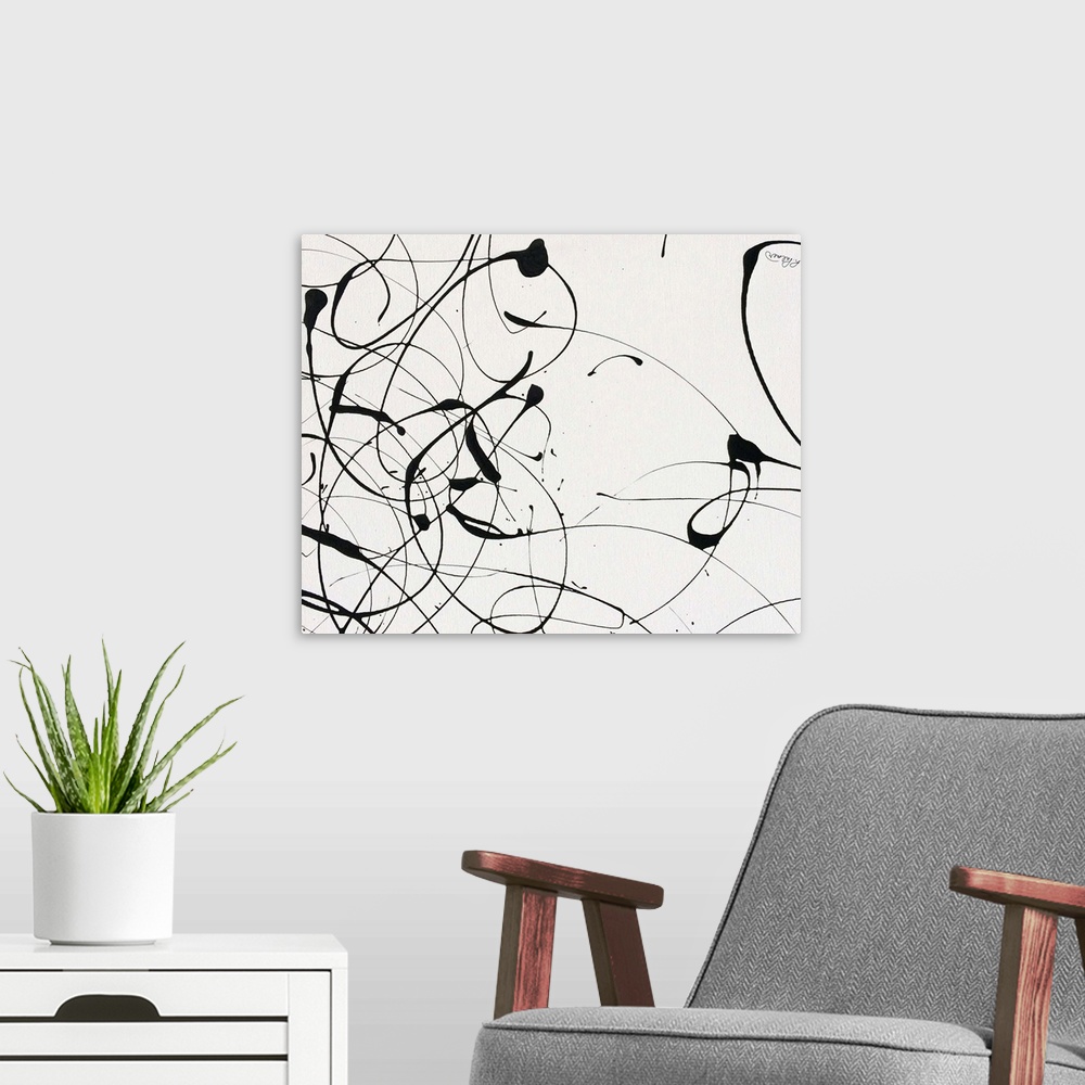 A modern room featuring A contemporary abstract painting of black paint drizzle on a tan background.