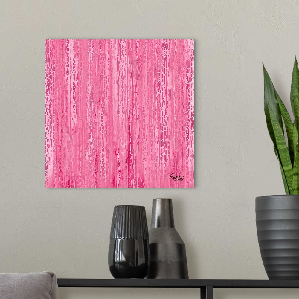 A modern room featuring Contemporary abstract art of cascading dots in bright pink.