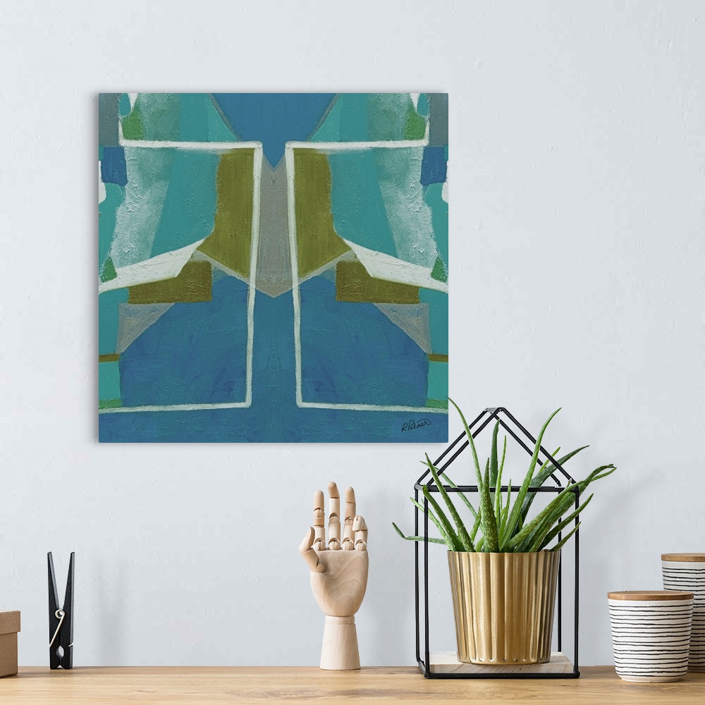 A bohemian room featuring Square abstract painting with blue and green symmetrical designs.