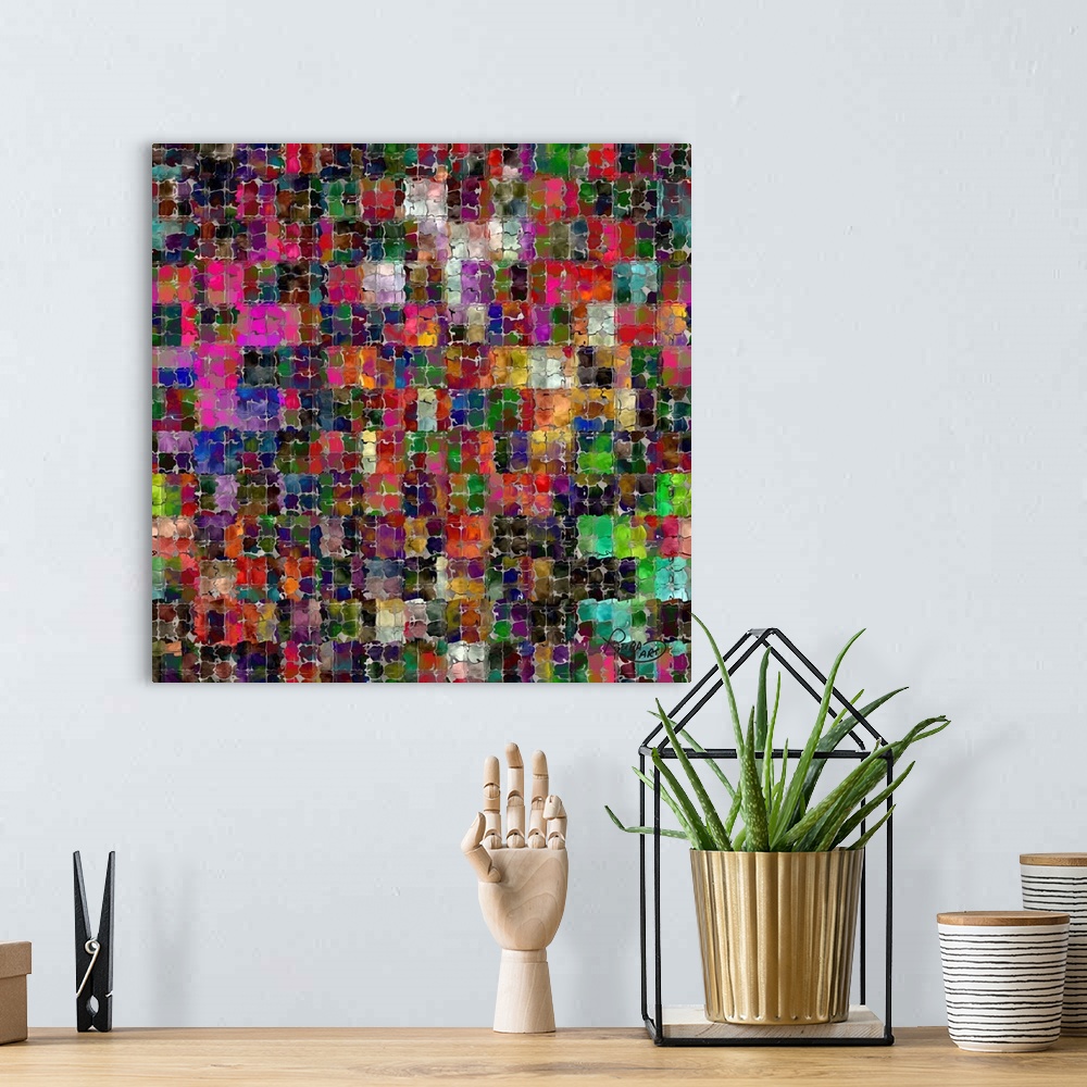 A bohemian room featuring Square abstract art with silver squiggly lines making small squares with different colors blended...