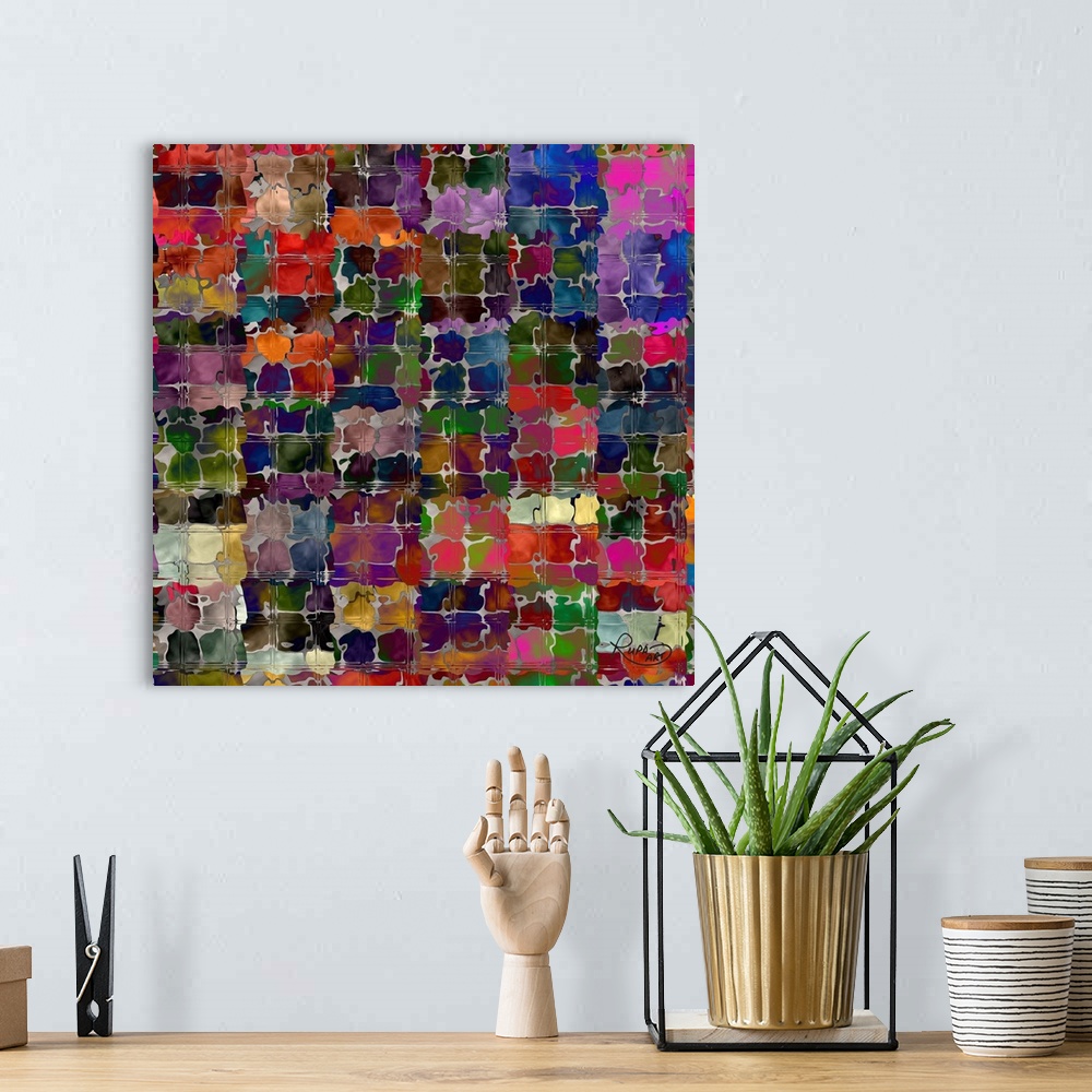 A bohemian room featuring Square abstract art with silver squiggly lines making small squares with different colors blended...