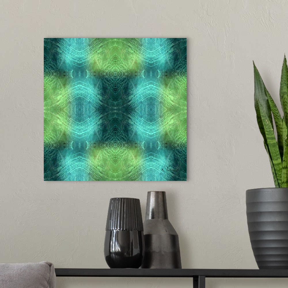 A modern room featuring Contemporary abstract painting using blue and green kaleidoscope type images.